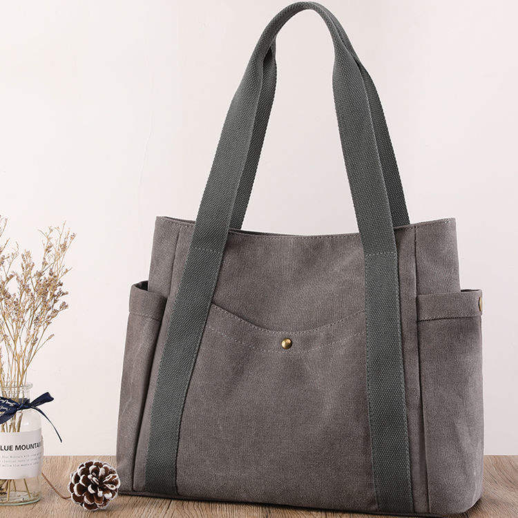 Baumwollsegeltuch-kundenspezifische Logo-Einkaufstaschen des China-Herstellers Frauen umweltfreundliche Einkaufstasche für Freizeitschularbeit