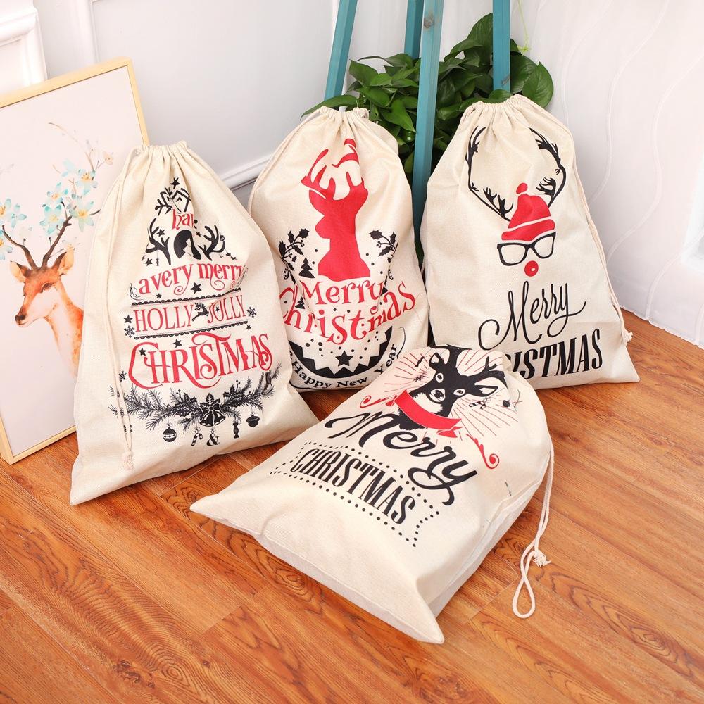 Heiße verkaufende große Kordelzugbeutel Weihnachten wiederverwendbare Baumwolltasche Rentier Santa Säcke Weihnachtsgeschenktüten